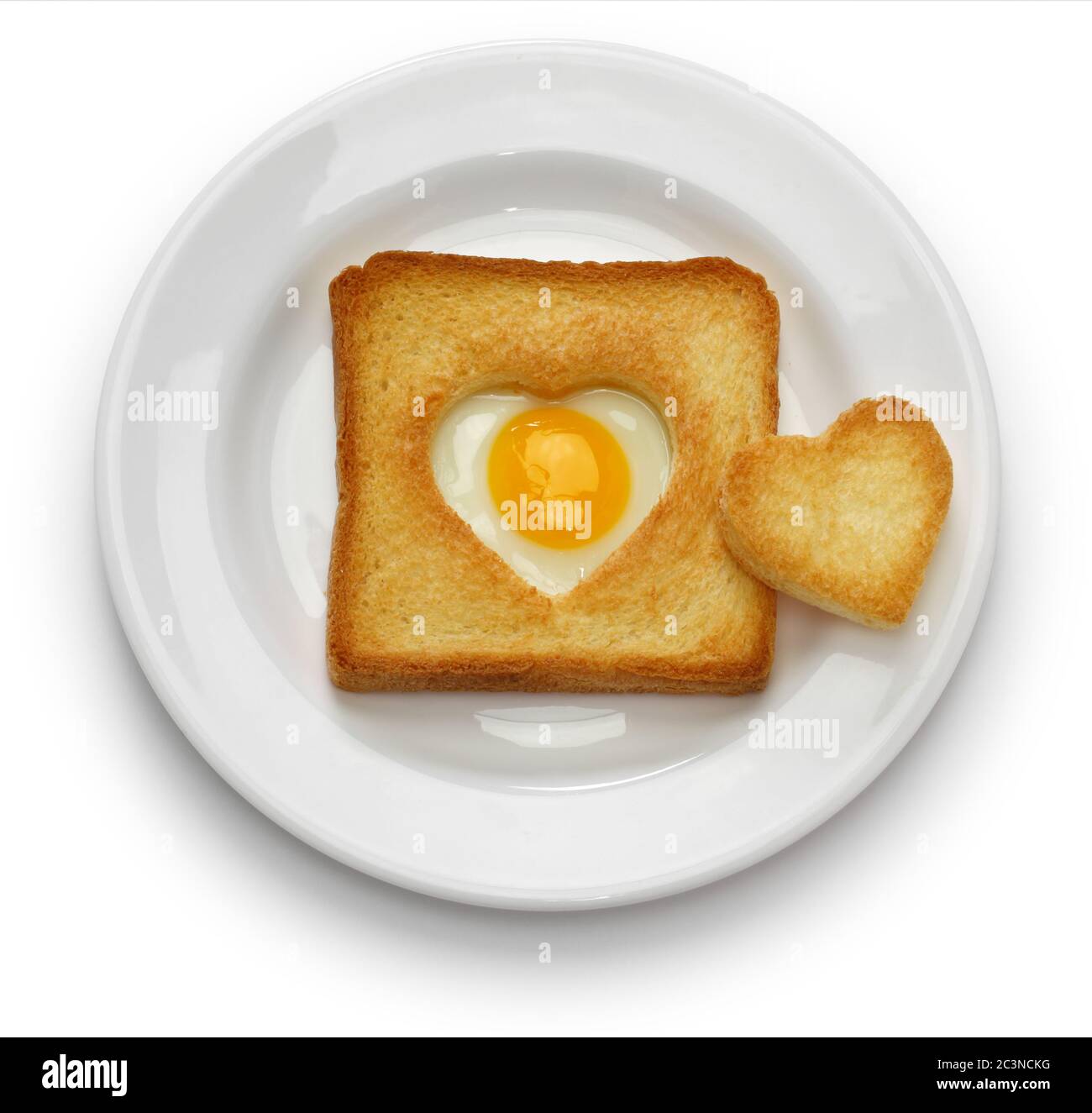Ei in einem Loch Brot dann Toast, die auch als Ei im Korb bekannt. Stockfoto
