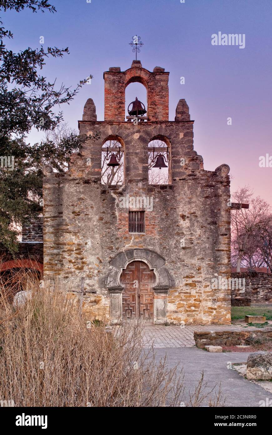 Kirche in Mission Espada bei Sonnenaufgang, San Antonio, Texas, USA Stockfoto