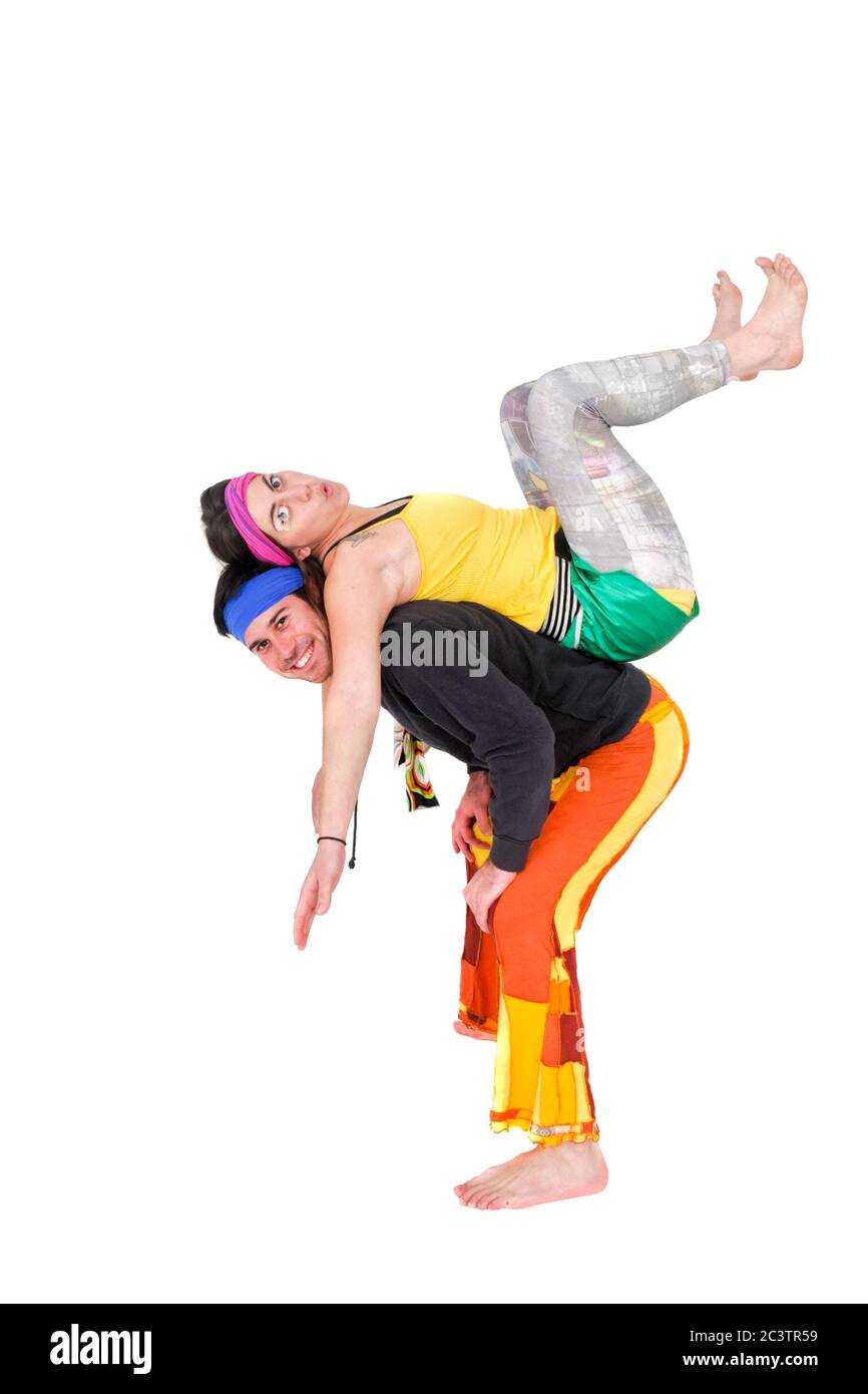 Balance - zwei Akrobaten balancieren aufeinander Stockfoto