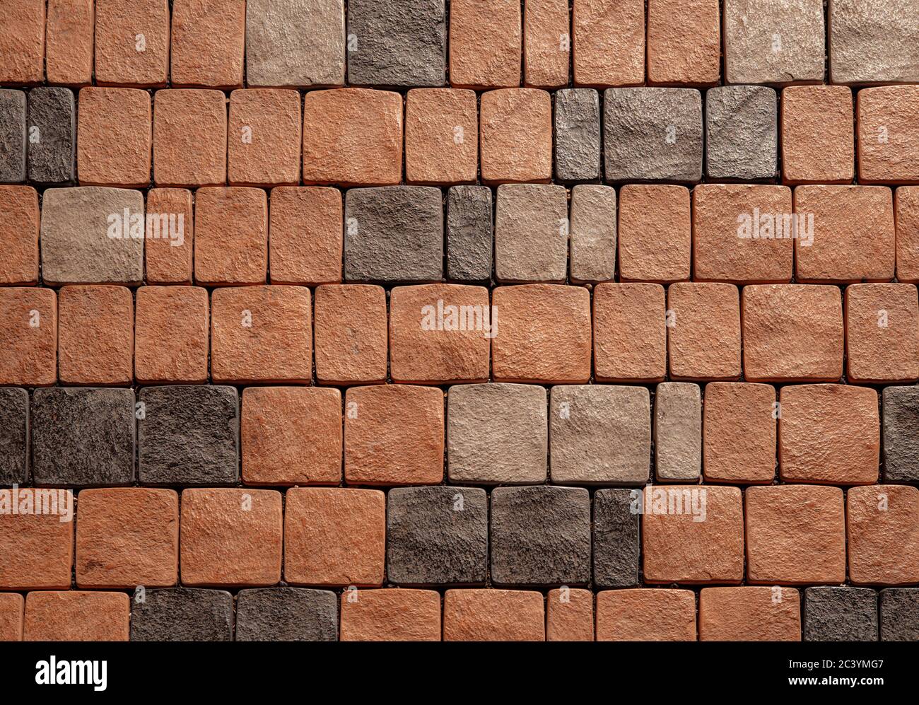 Alten roten Stein quadratische Wand flach Hintergrund closeup Stockfoto