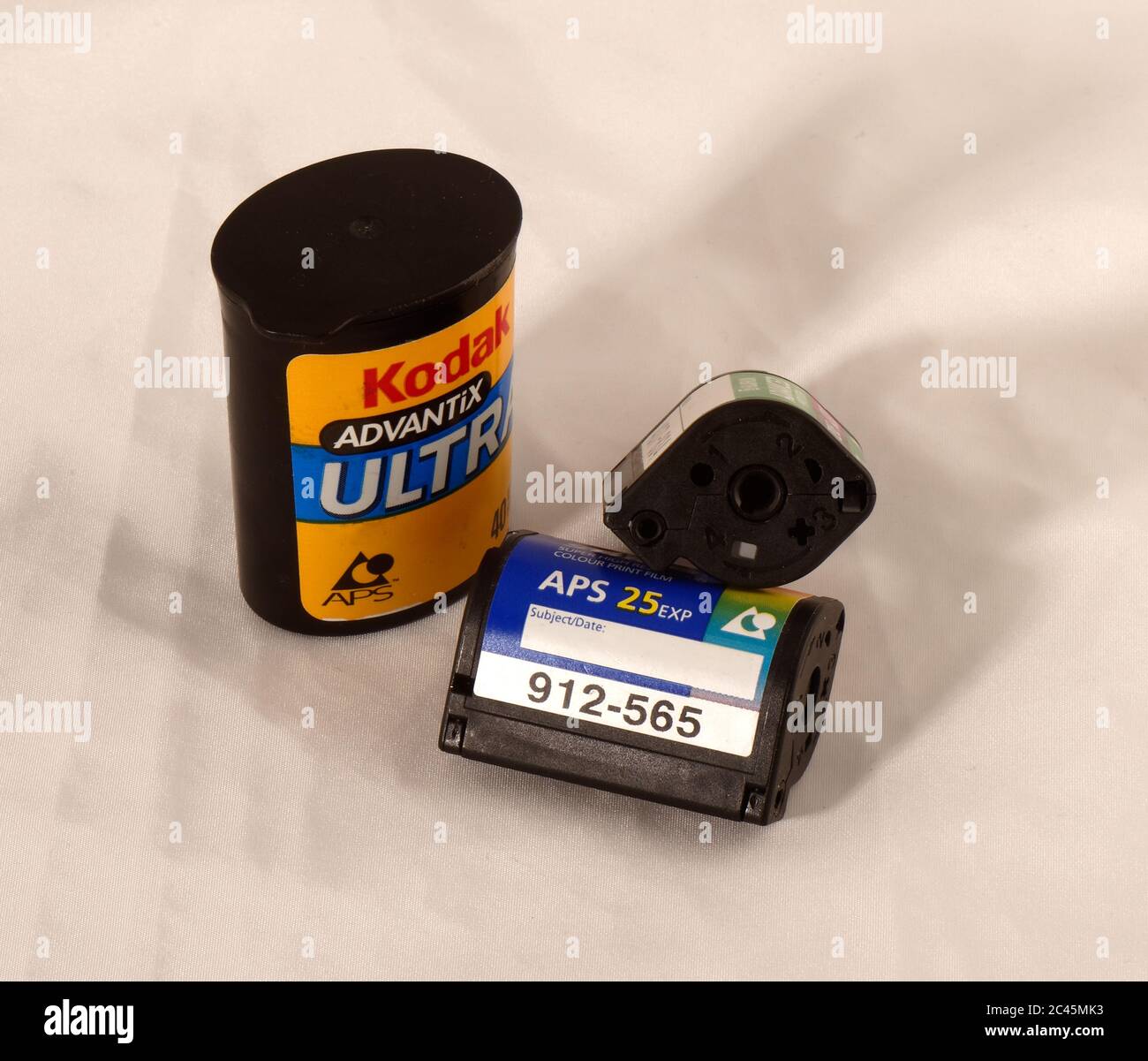 Alte Technologie-Kanister von APS-Druckfilm von Kodak und Fuji Stockfoto