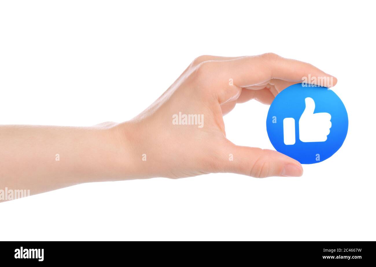 Kiew, Ukraine - 15. Mai 2019: Hand hält neue Facebook wie empathische Emoji-Reaktion, gedruckt auf Papier. Facebook ist ein bekannter Social-Networking-Anbieter Stockfoto