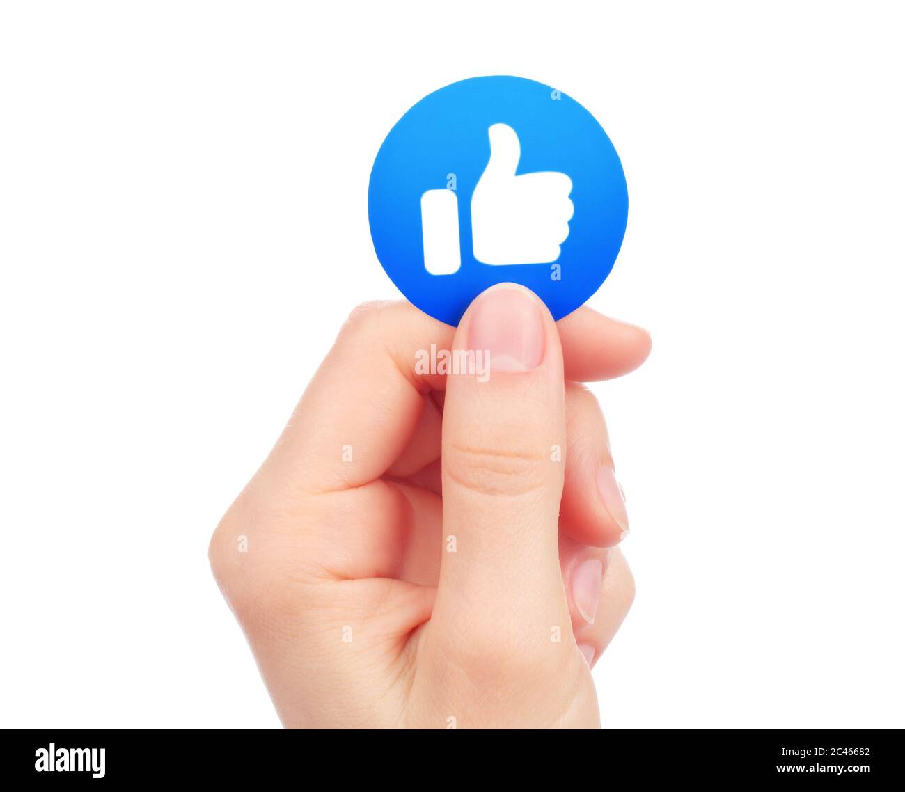 Kiew, Ukraine - 15. Mai 2019: Hand hält Neues Facebook wie empathische Emoji-Reaktion, gedruckt auf Papier. Facebook ist ein bekannter Social-Networking-Anbieter Stockfoto
