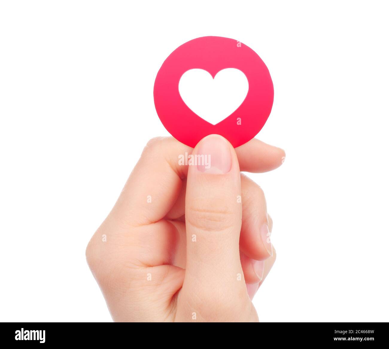Kiew, Ukraine - 15. Mai 2019: Hand hält neue Facebook Love empathische Emoji-Reaktion, gedruckt auf Papier. Facebook ist ein bekannter Social-Networking-Anbieter Stockfoto