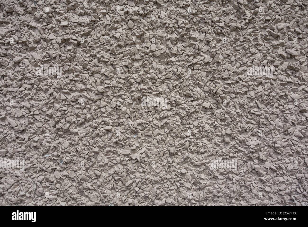 Nahtlose zerkleinerten Stein in Zement, Putz Wand Textur Hintergrund Stockfoto