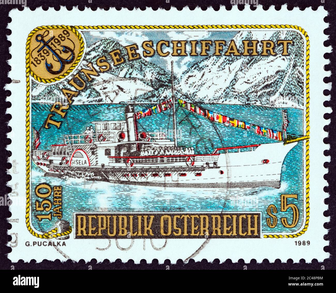 ÖSTERREICH - UM 1989: Eine in Österreich gedruckte Briefmarke zum 150-jährigen Jubiläum der Passagierschifffahrt am Traunsee zeigt Gisela (Raddampfer) Stockfoto ÖSTERREICH - UM 1989: Eine in Österreich gedruckte Briefmarke zum 150-jährigen Jubiläum der Passagierschifffahrt am Traunsee zeigt Gisela (Raddampfer) Stockfoto