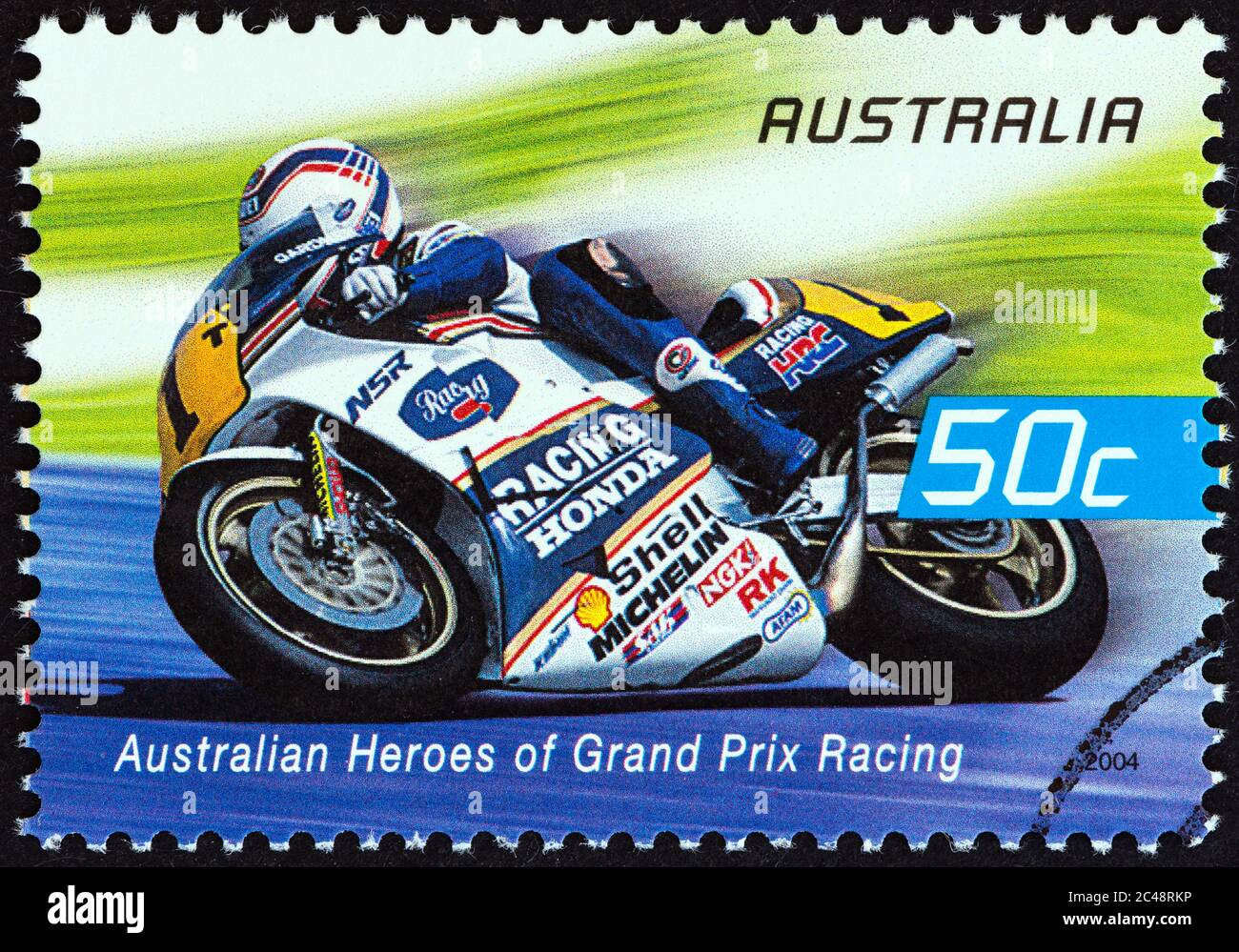 AUSTRALIEN - UM 2004: Eine in Australien gedruckte Marke aus der Ausgabe 'Australian Heroes of Grand Prix Racing' zeigt Wayne Gardner (Rothmans Honda) Stockfoto
