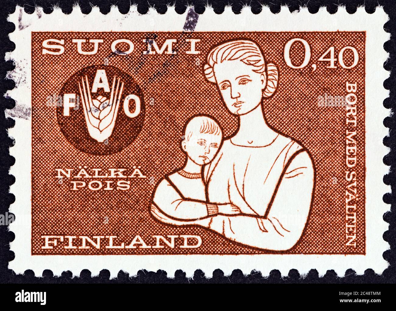 FINNLAND - UM 1963: Eine in Finnland gedruckte Marke aus der Ausgabe "Freiheit vom Hunger" zeigt Mutter und Kind, um 1963. Stockfoto