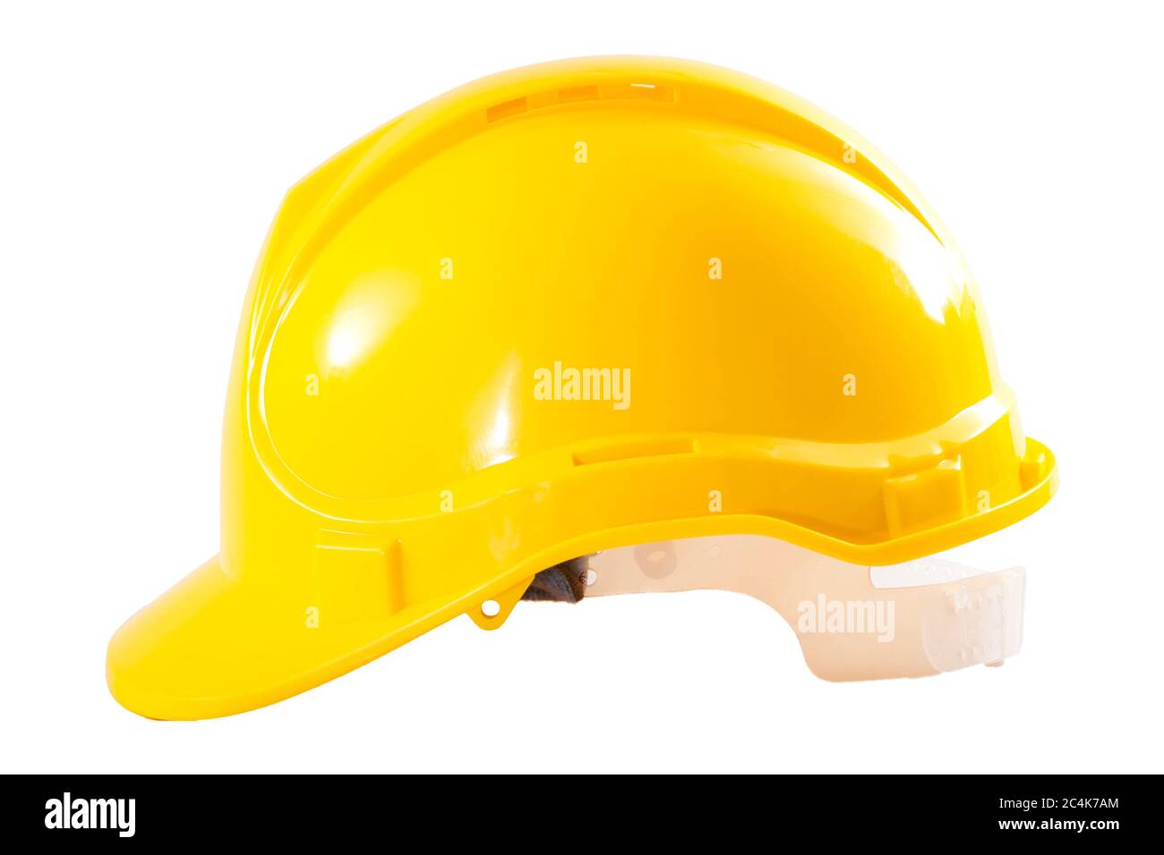 Industriearbeiter oder Baustellenschutzausrüstung Konzept mit Seitenansicht eines gelben Harthuttes isoliert auf weißem Hintergrund mit einem Clipping-Pfad Stockfoto