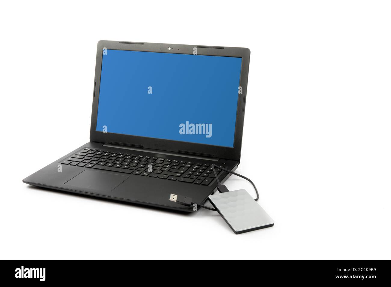 Eine externe USB-Festplatte auf einem Computer, eine Quelle für Computersicherheitsrisiken Stockfoto