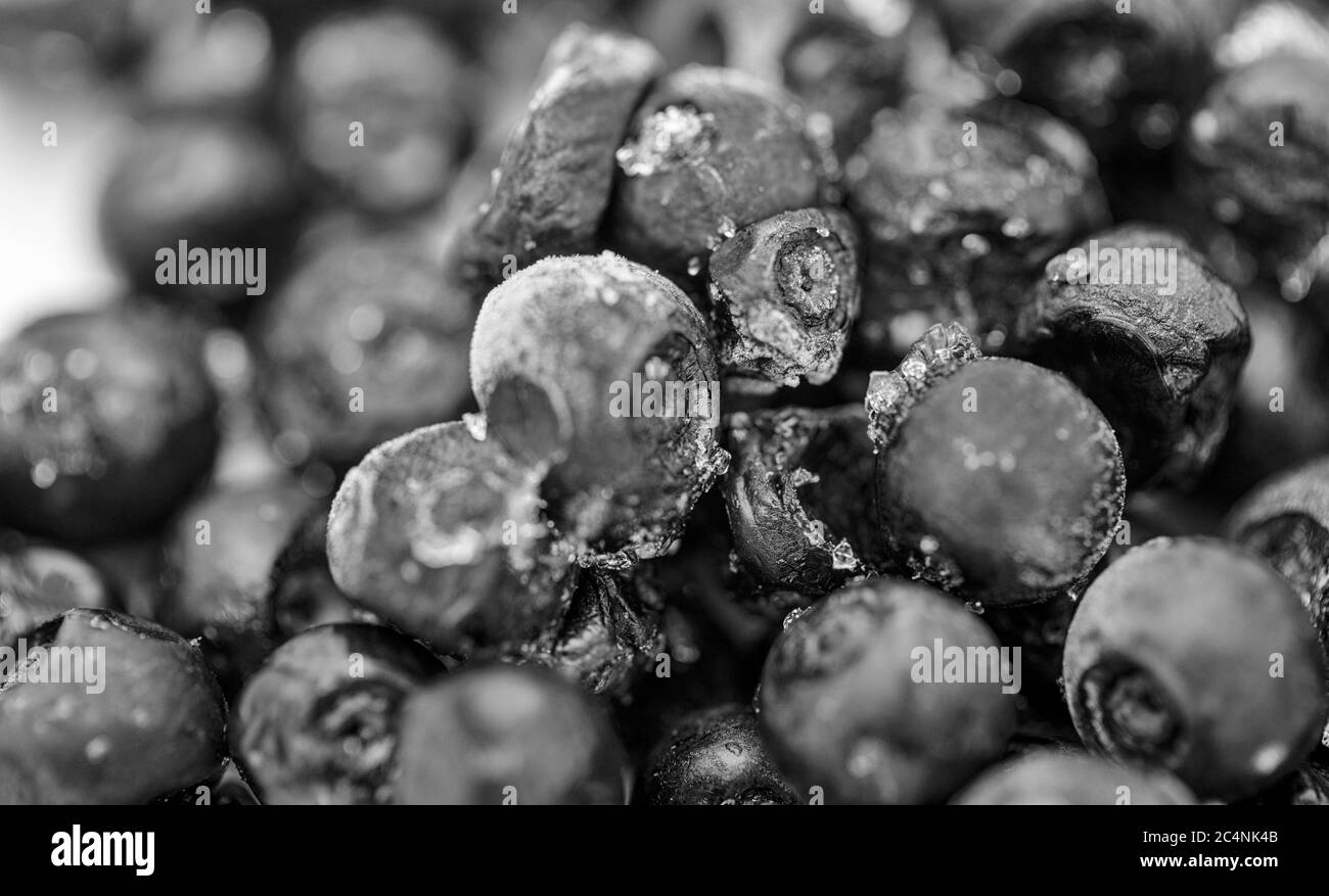Gefrorene Heidelbeer Früchte, Nahaufnahme, Draufsicht, Vollformat, Obst Hintergrund. Stockfoto