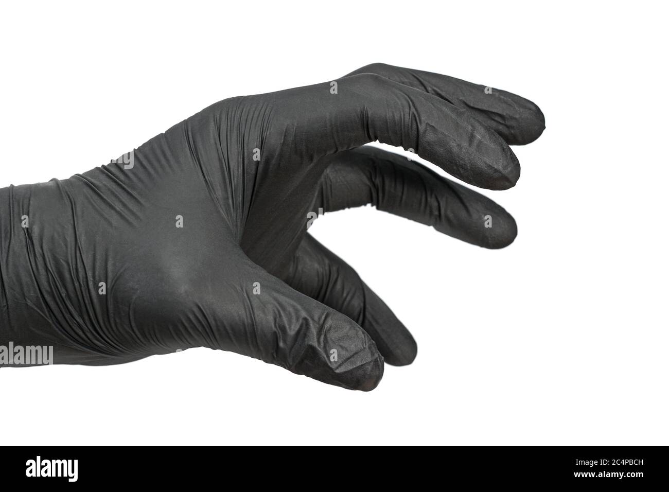 Hand in schwarzen Gummihandschuh gekleidet ist beängstigend mit einer schrecklichen Geste, isoliert auf weißem Hintergrund. Stockfoto