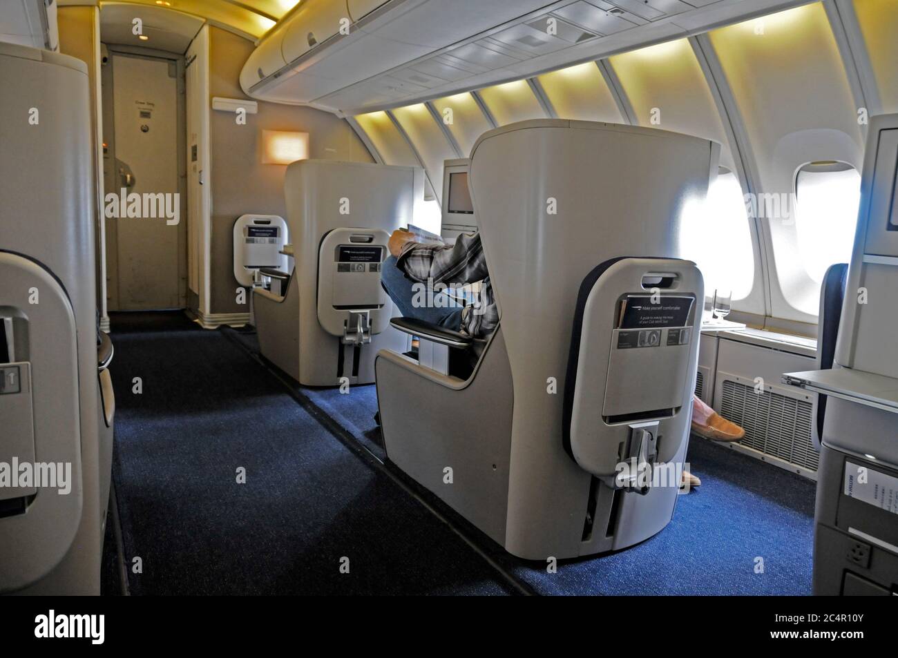 Club World (Langstreckengeschäftsklasse) auf dem Oberdeck einer British Airways B747-400. Stockfoto Club World (Langstreckengeschäftsklasse) auf dem Oberdeck einer British Airways B747-400. Stockfoto