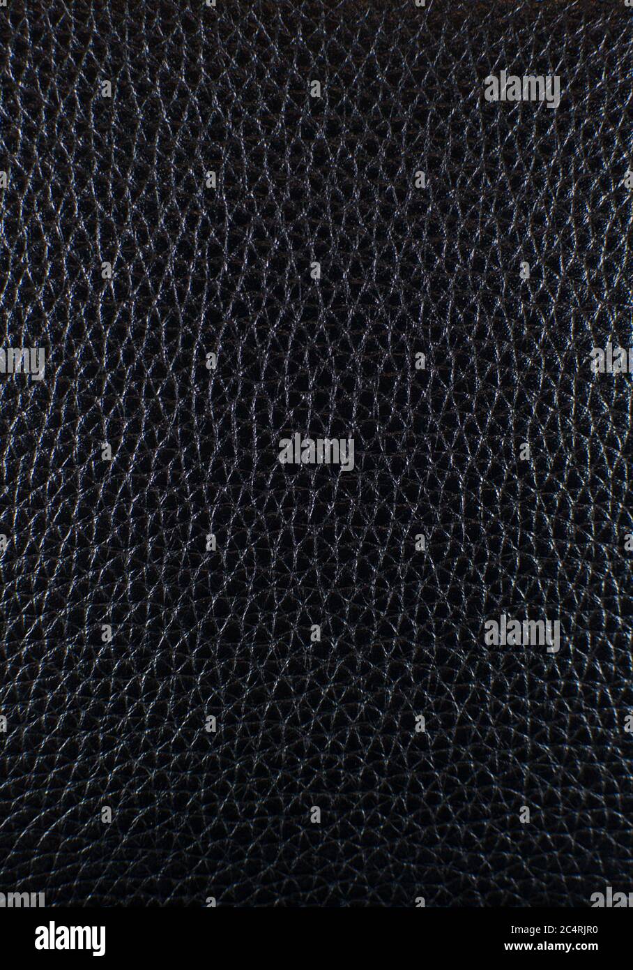 Die Textur von schwarzem Leder Stockfoto