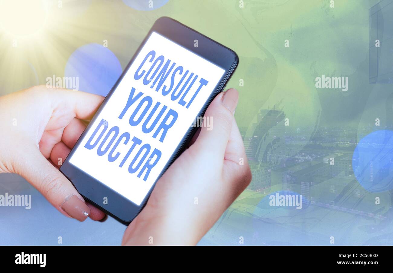 Text der Handschrift Befragen Sie Ihren Arzt. Konzeptionelle Foto fragen Sie Informationen oder Rat von einem medizinischen Profi moderne Gadgets mit weißem Display-Bildschirm Stockfoto