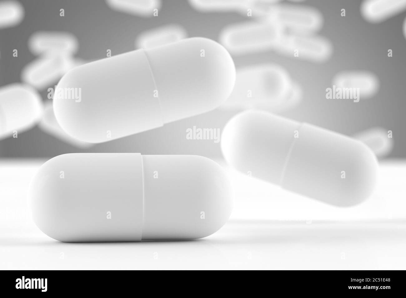 Fallende weiße Kapseln mit einem Medikament mit schön verschwommenem Hintergrund; 3d-Illustration Konzept Stockfoto