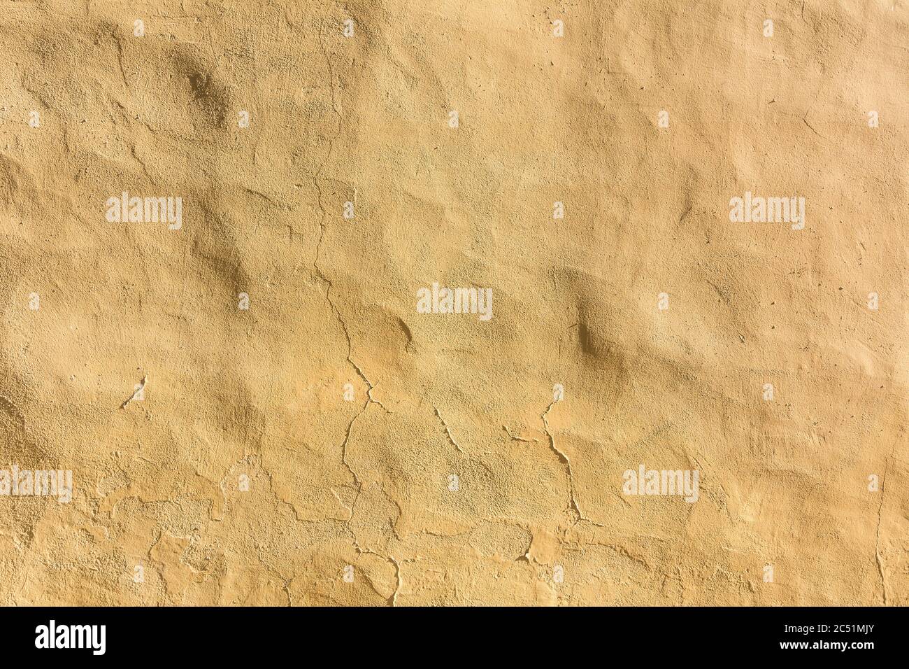 Hintergrund gelb, beige verputzte Wand Stockfoto