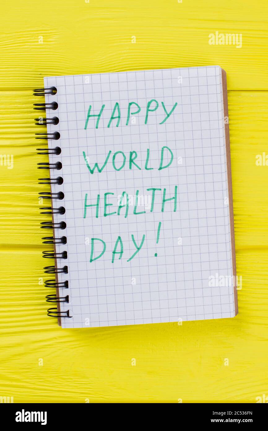 Notizblock mit glücklichen Welt Gesundheit Tag Wunsch. Stockfoto