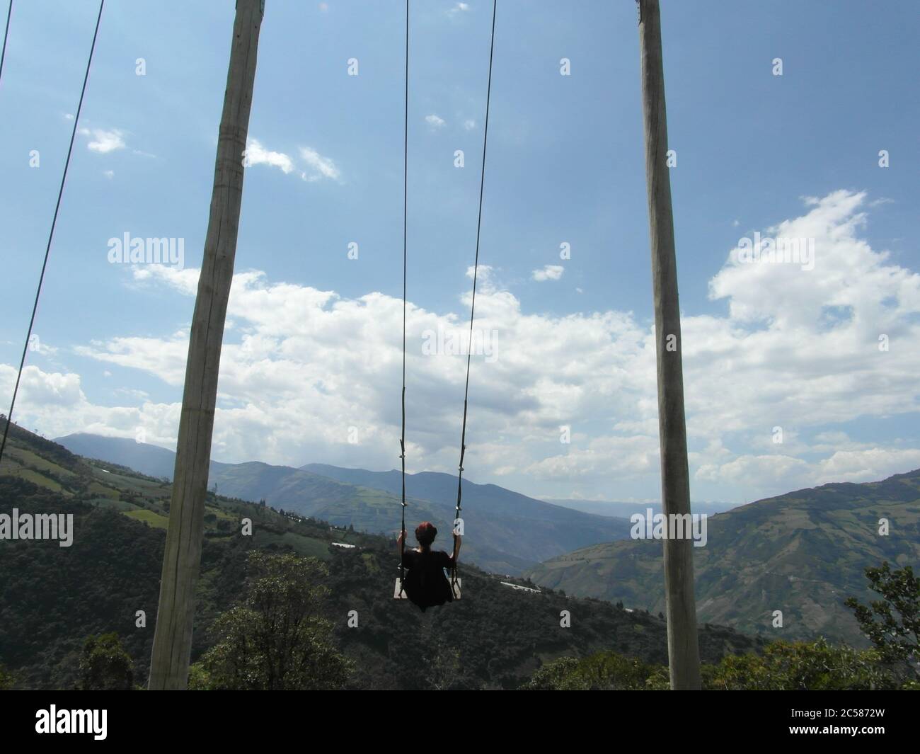 Atemberaubende Berge in Banos und das berühmte "Baumhaus". Casa de Arbol, Ecuador Stockfoto Atemberaubende Berge in Banos und das berühmte "Baumhaus". Casa de Arbol, Ecuador Stockfoto