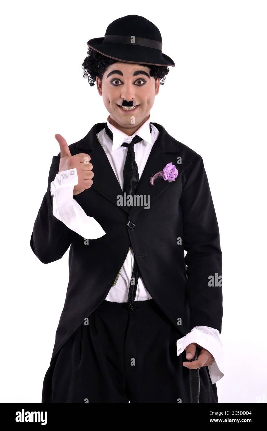Personifikation von Charlie Chaplin auf weißem Hintergrund. Stockfoto