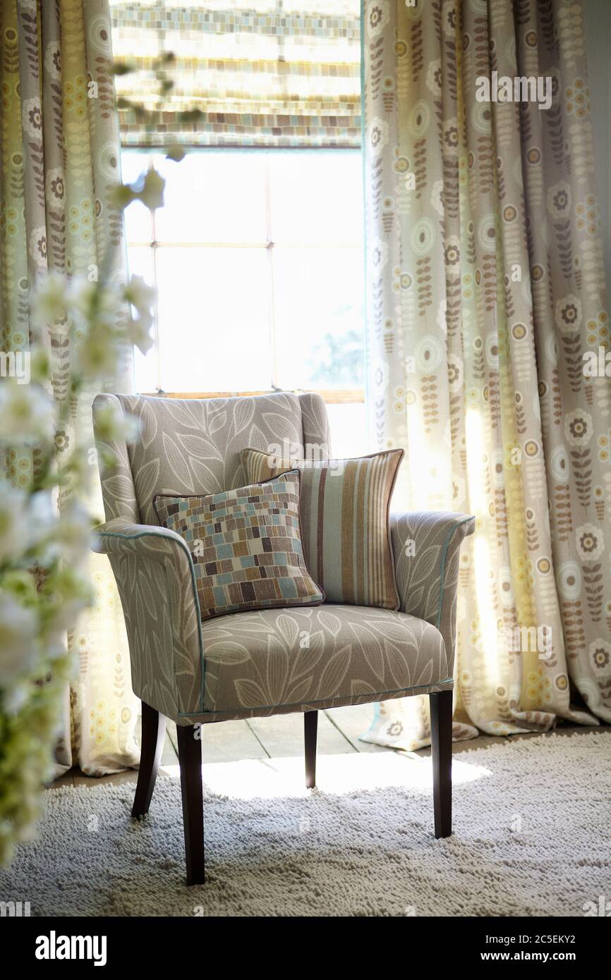 Aufnahme eines gemütlichen Sessel im Wohnzimmer Stockfoto