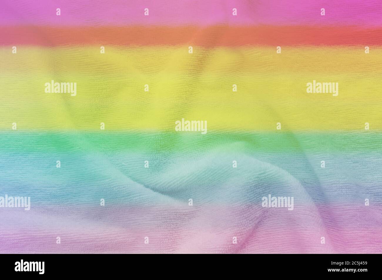 Weiches Gewebe in Regenbogenfarben. Mehrfarbige Stoff Textur Hintergrund Stockfoto