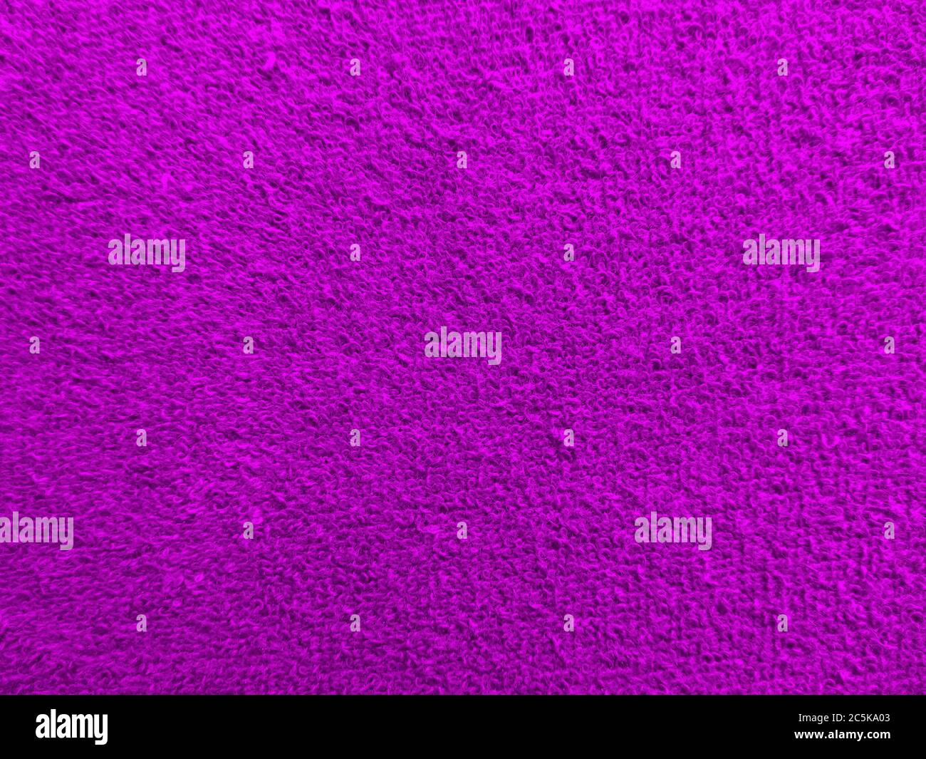Textur aus violettem Frottee Nahaufnahme Stockfoto