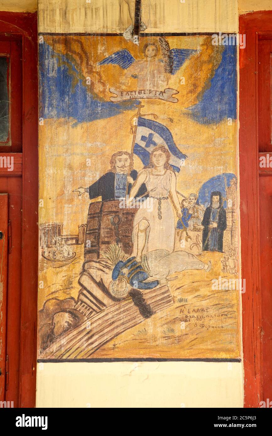 Gemälde von Theofilos, dem berühmten griechischen Volksmaler von der Insel Lesbos, an der Fassade der alten Bäckerei Velentzas, im Dorf Alli Meria, Magnesia. Stockfoto