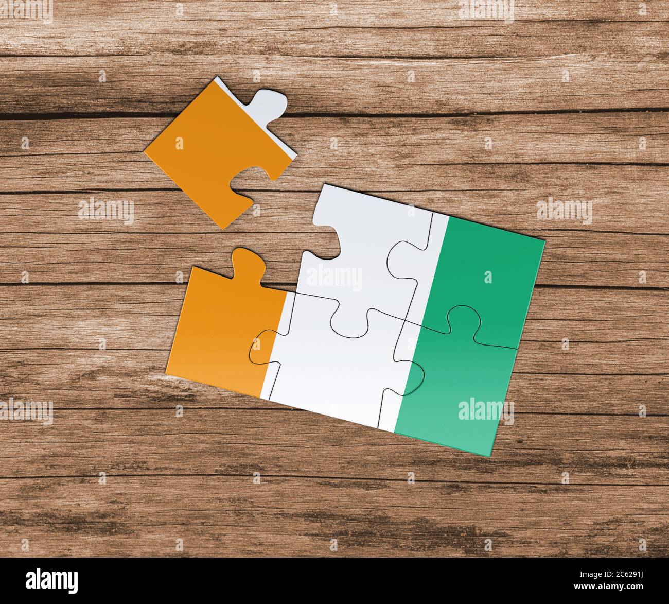 Cote D'Ivoire Nationalflagge auf Puzzle. Ein Stück fehlt. Gefahrenkonzept. Stockfoto