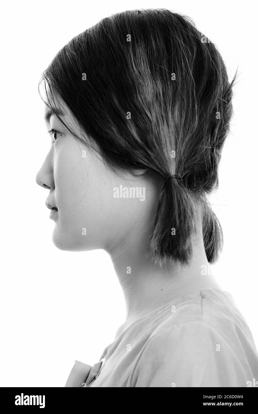 Profil anzeigen von Gesicht der jungen schönen asiatischen Frau Stockfoto