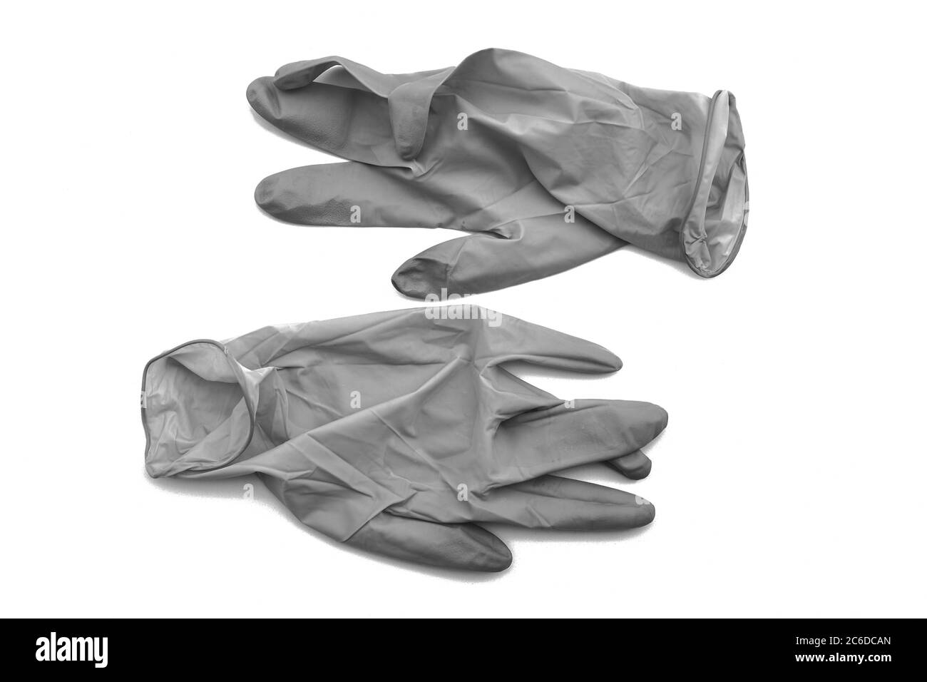 Covid-19 kontaminierte Einweg-Handschuhe. Coronavirus Latex Plastikmüll. Pandemie Stockfoto