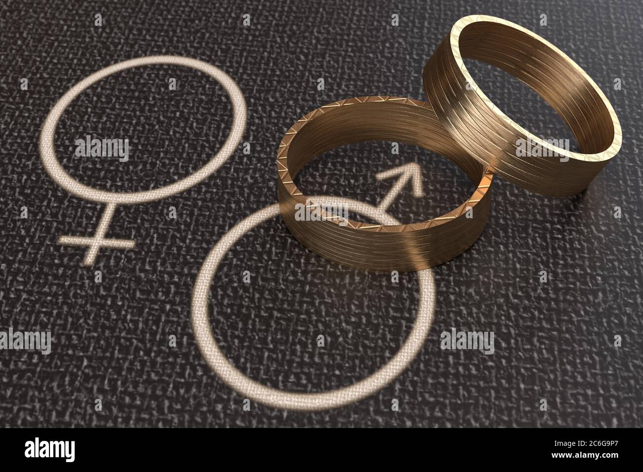 Zwei Eheringe und Symbole weiblich, männlich Stockfoto