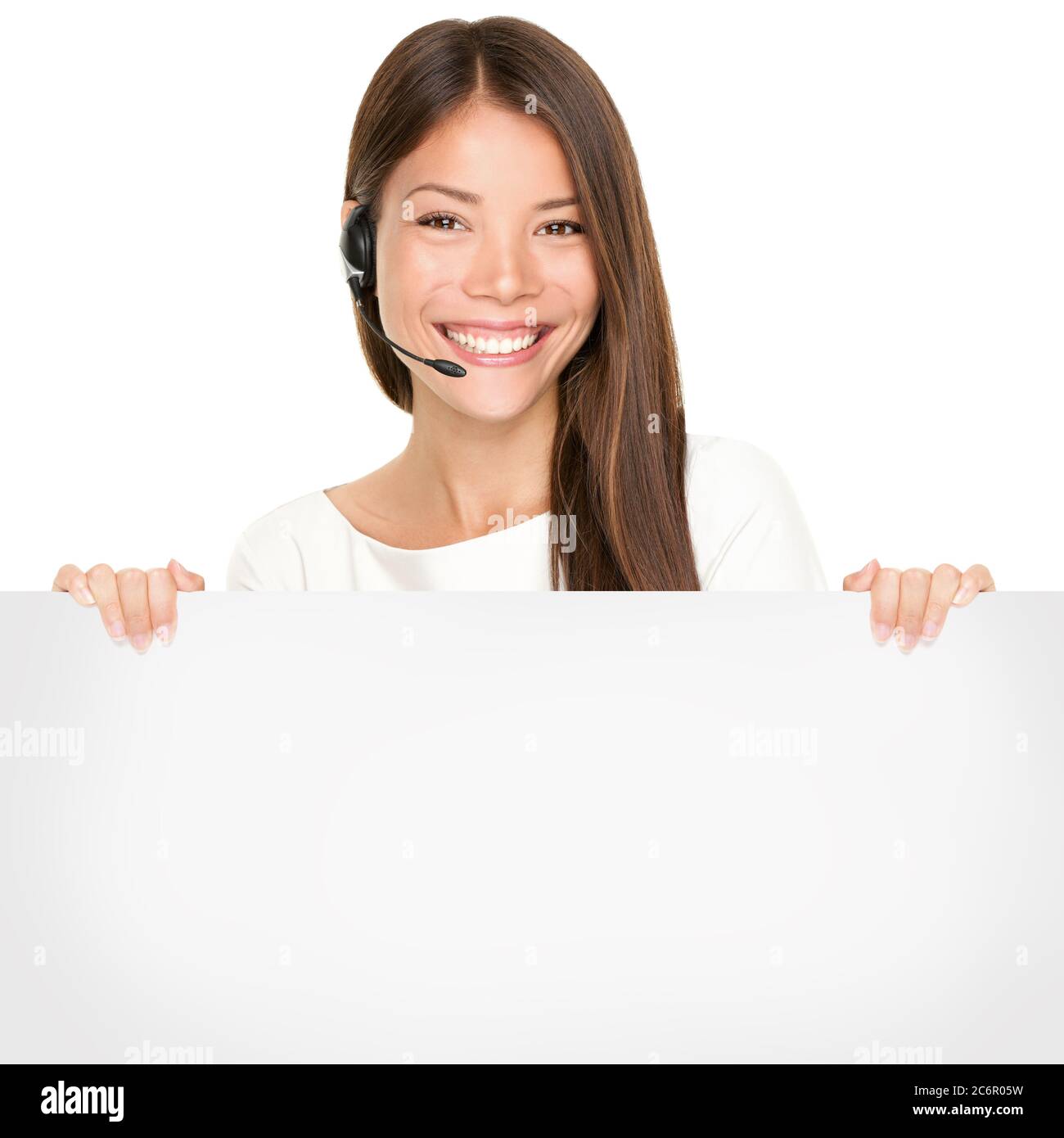 Schöne asiatische Frau mit einem leeren Zeichen Stockfoto