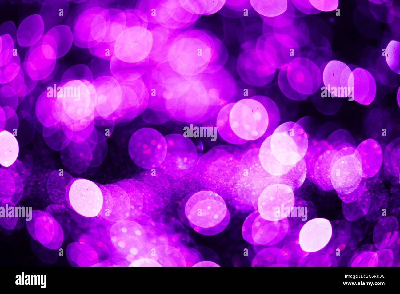 Abstrakt leuchtend lila Partikel Hintergrund. Stockfoto