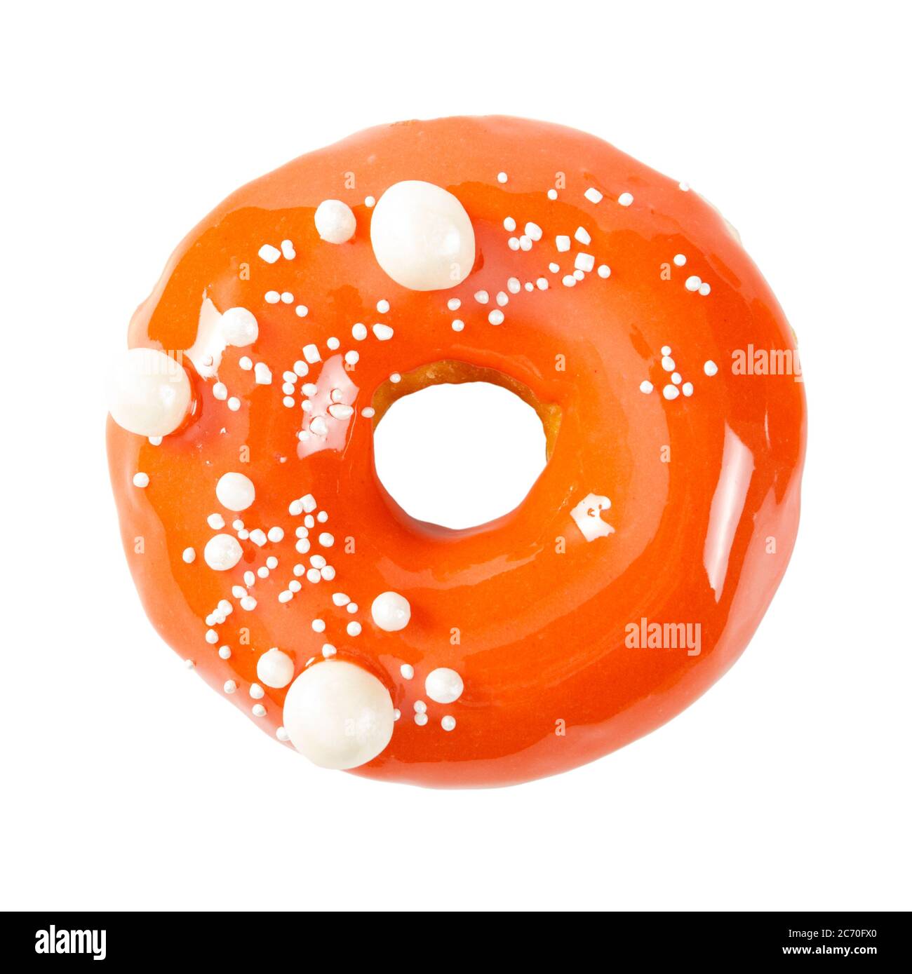 Donut mit orange glänzende Spiegelglasur isoliert auf weißem Hintergrund. Draufsicht. Stockfoto