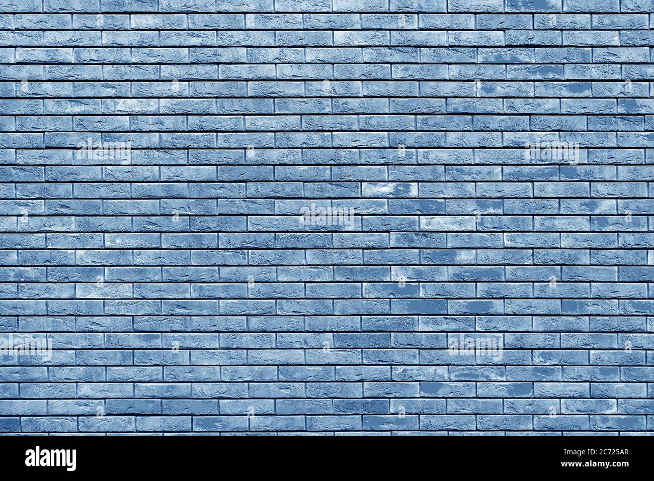 Blaue Ziegelwand. Loft-Innenarchitektur. Blaue Farbe der Fassade. Stockfoto