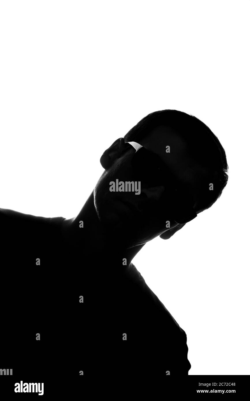 Porträt eines jungen Mannes in der Vorderansicht diagonal - Silhouette Stockfoto