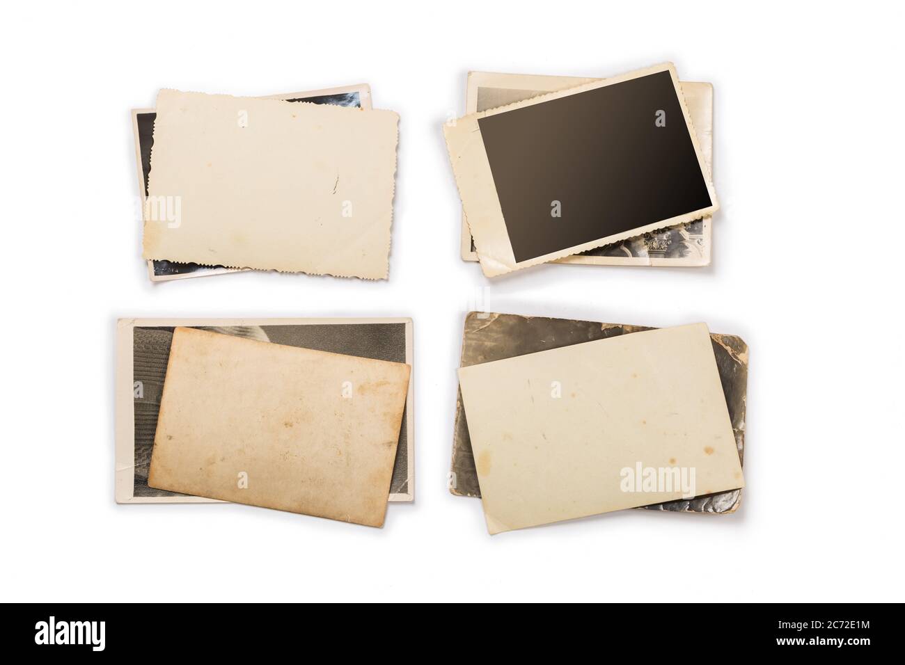 Stapel alter Fotos mit Beschneidungspfad für die Innenseite Stockfoto