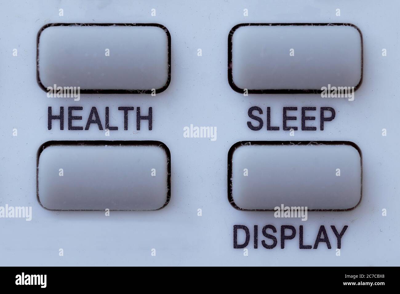 Schaltflächen auf weißem Hintergrund mit den Aufschriften Gesundheit, Schlaf. Isoliertes Foto. Stockfoto