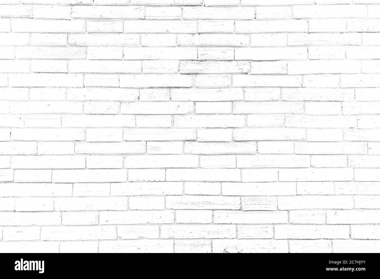 Weiße Ziegelwände, die nicht verputzt Hintergrund und Textur. Die Textur des Ziegels ist weiß. Hintergrund der leeren Backsteinkeller Wand. Stockfoto