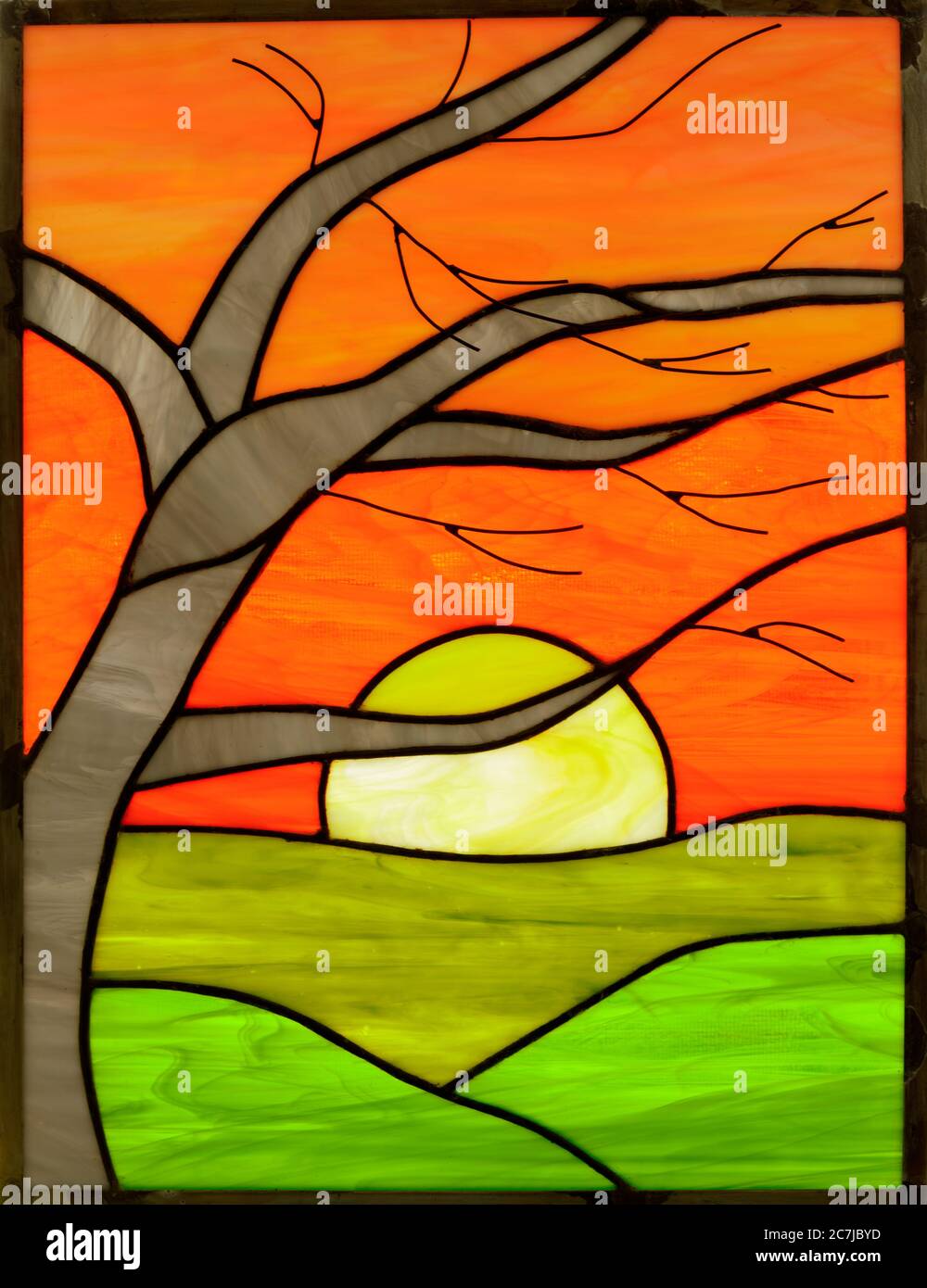 Buntglas Fenster Panel von Birch Sunrise Stockfoto