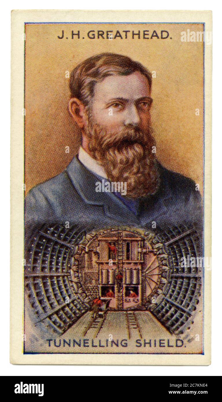 Eine alte Zigarettenkarte (c. 1929) mit einem Porträt von J. G. Greathead und einer Illustration seines Tunnelschildes. James Henry Greathead (1844–1896) war ein Maschinen- und Bauingenieur, der für seine Arbeiten an den Londoner U-Bahn-Zügen bekannt war. Seine Erfindung war der Tunnelschild. Der Greathead Schild bestand aus einem Eisenzylinder mit Schraubhebebühnen, die es ermöglichten, sich vorwärts zu bewegen. Im Einsatz wurde der Schild beim Aushub der Arbeitsfläche nach vorne gegraben, während dahinter eine permanente Tunnelauskleidung aus Gusseisensegmenten angebracht wurde. Stockfoto