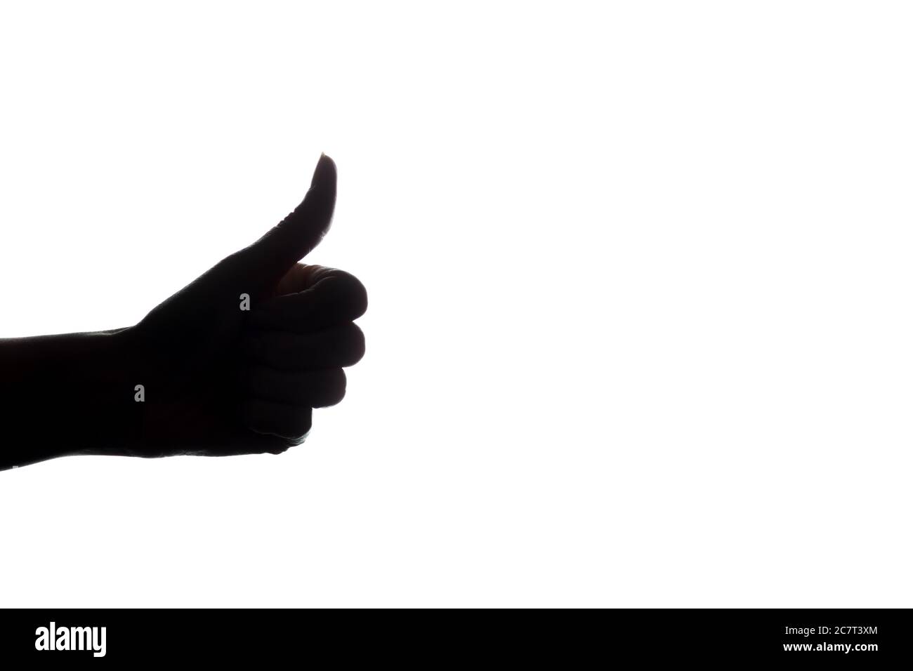 Frauen Hand gestreckt nach vorne mit einem OK-Zeichen auf weißem Hintergrund - Silhouette OK-Zeichen auf weißem Hintergrund Stockfoto