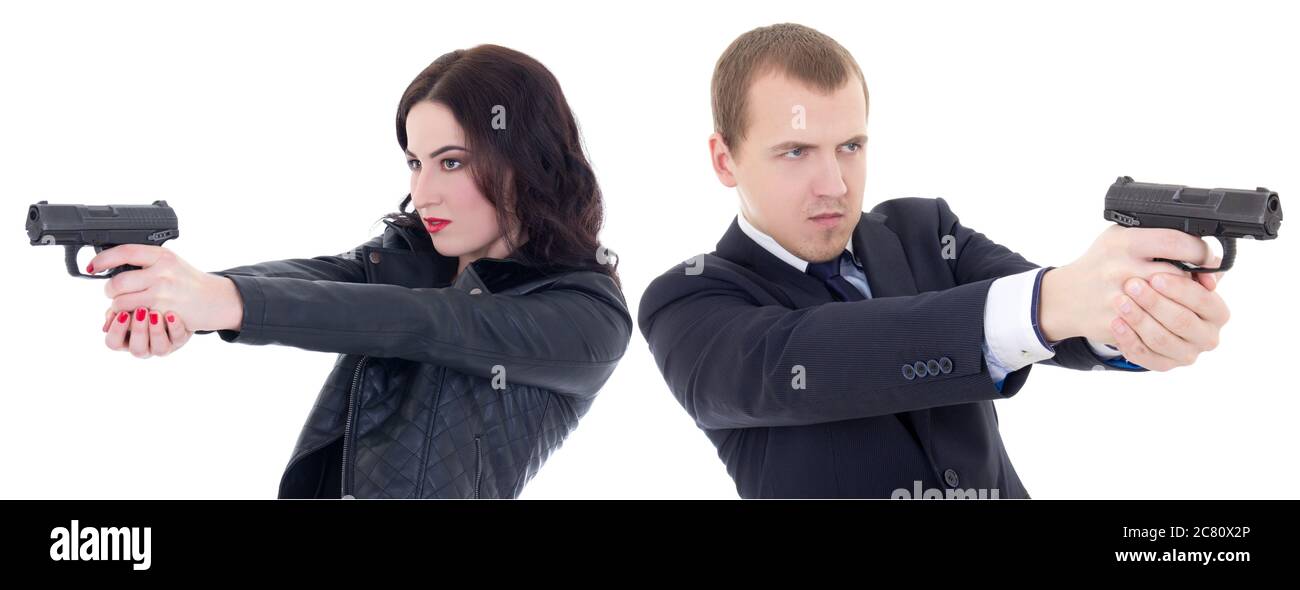 Junge schöne Frau und Mann schießen mit Gewehren isoliert auf weißem Hintergrund Stockfoto