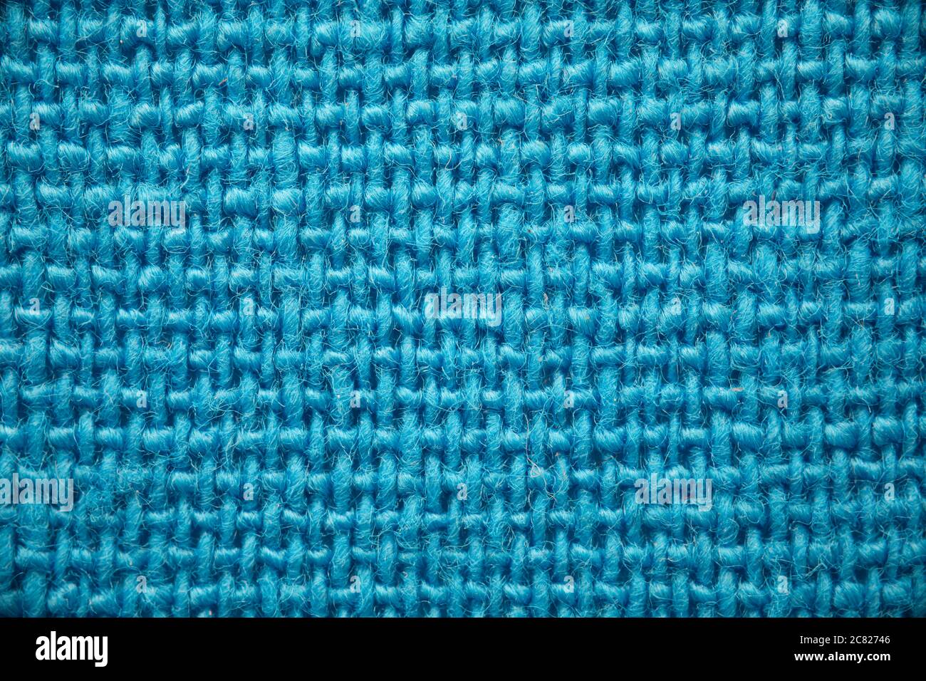 Nahaufnahme von gestrickten nahtlosen Hintergrund blau Stockfoto