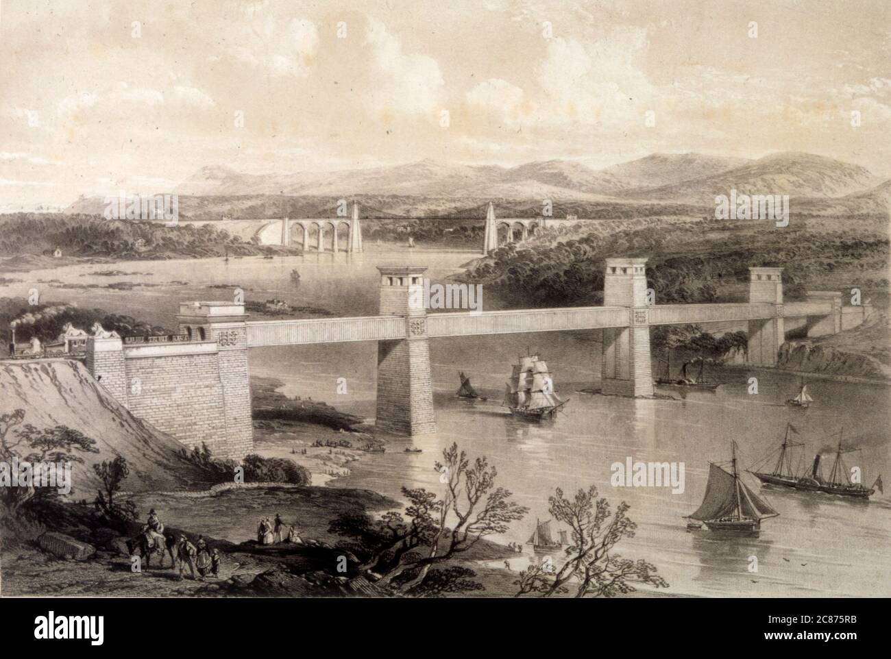 Schiffe, die unter der Menai Suspension and Tubular Bridge vorbeifahren, die von Thomas Telford gebaut wurde und im Januar 1826 eröffnet wurde. Stockfoto