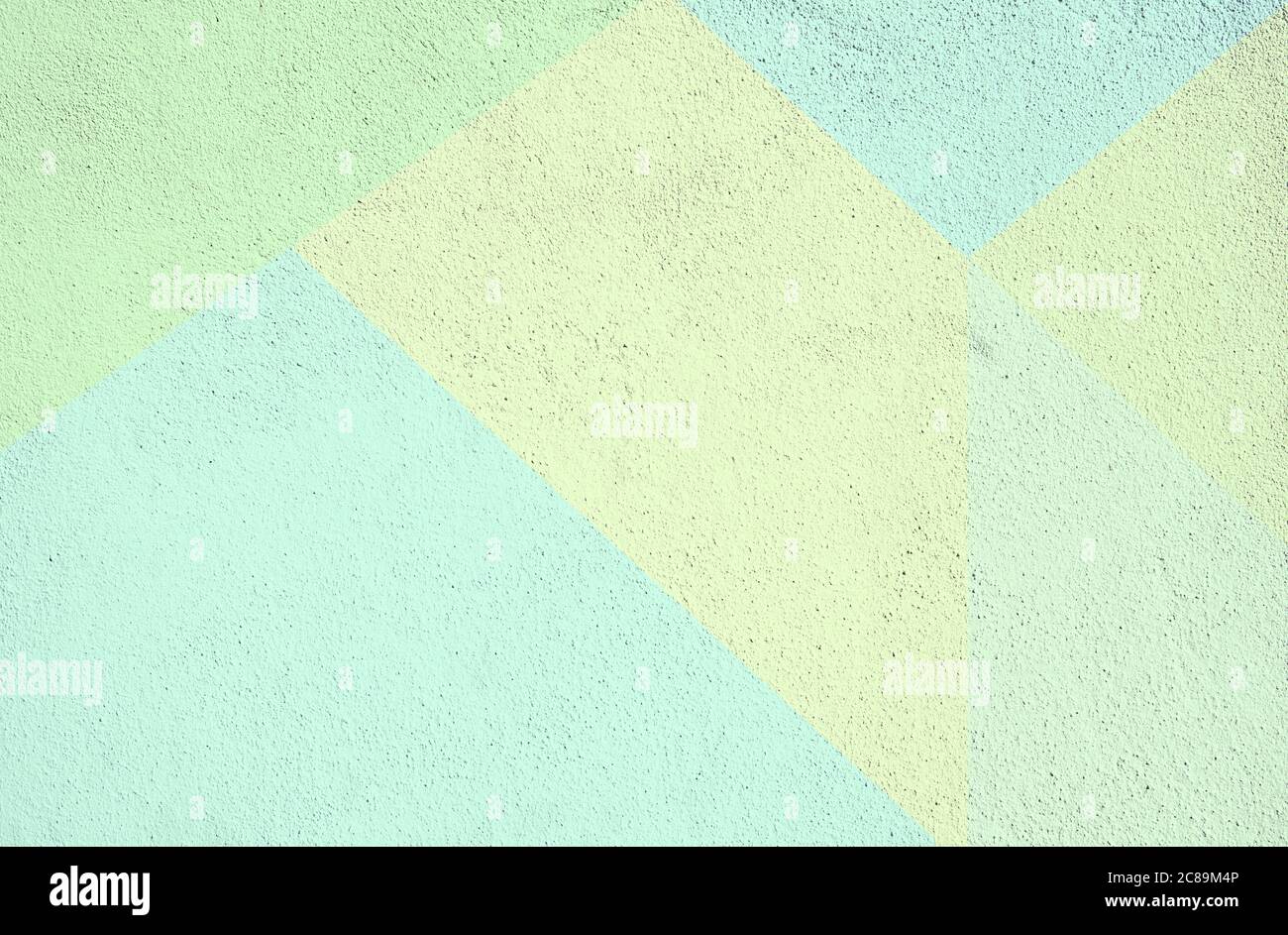 Bunte Beton gemalt Hintergrund Textur. Grün gelb künstlerische strukturierte Kulisse Stockfoto