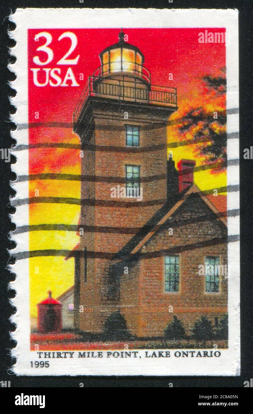 USA - UM 1995: Briefmarke gedruckt von USA, zeigt Leuchtturm, Thirty Mile Point, Lake Ontario, um 1995 Stockfoto