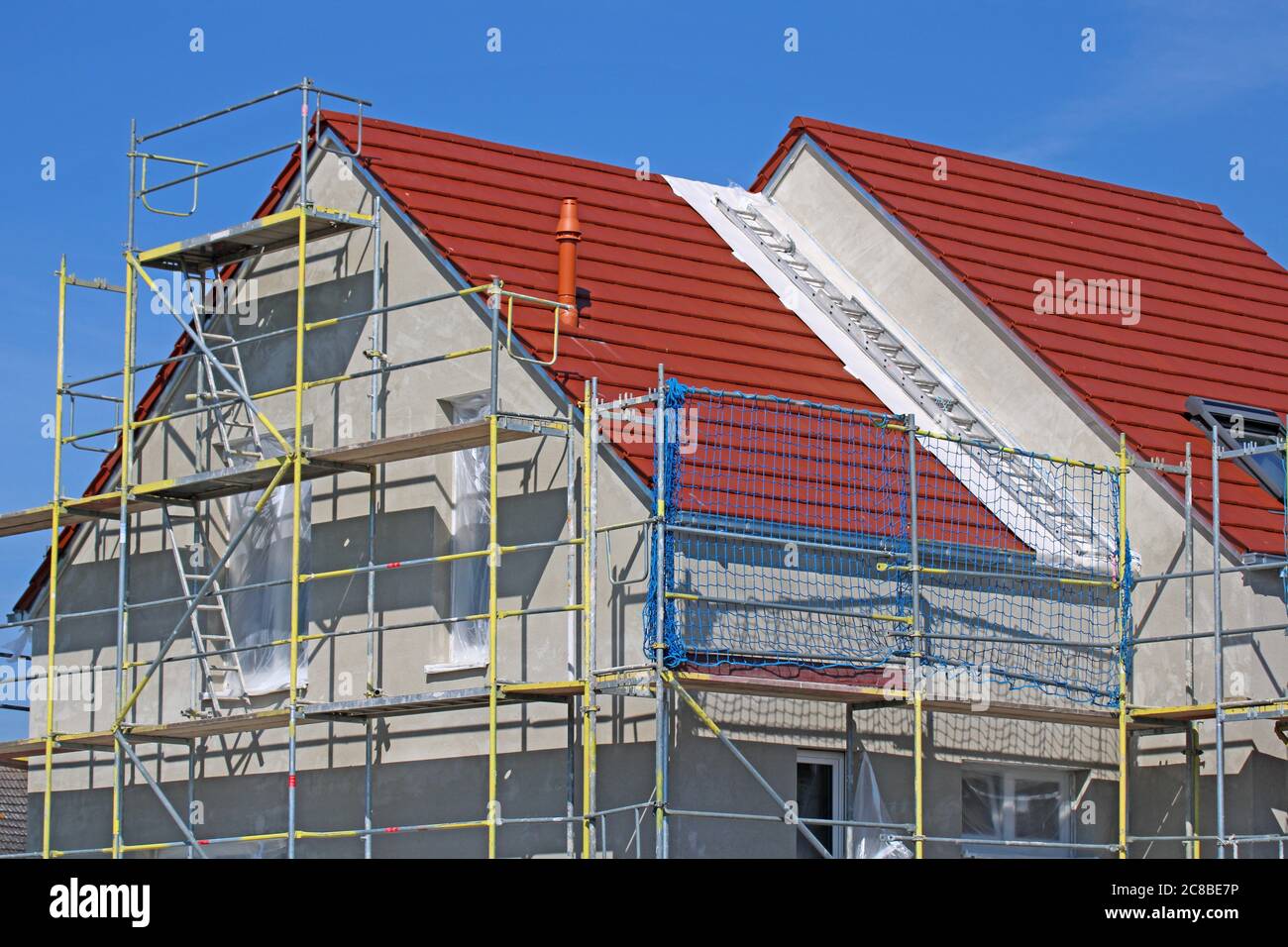 Neubau mit fertiger Grundputz Stockfoto