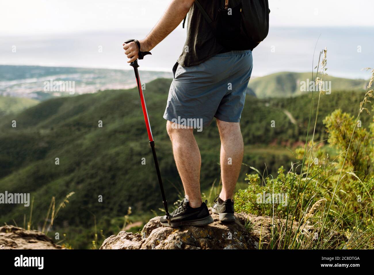 Wanderer auf der Spitze eines Berges Stockfoto